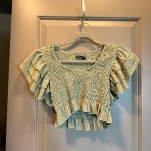 Green ruffle crop top